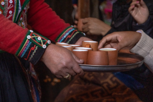 peruvian hands and tea time - Altitude in Cusco: How to Prepare and Enjoy Your Trip